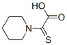 1-Piperidineacetic  acid,  -alpha--thioxo-
