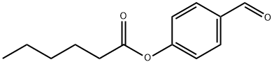 Hexanoic acid 4-formylphenyl ester